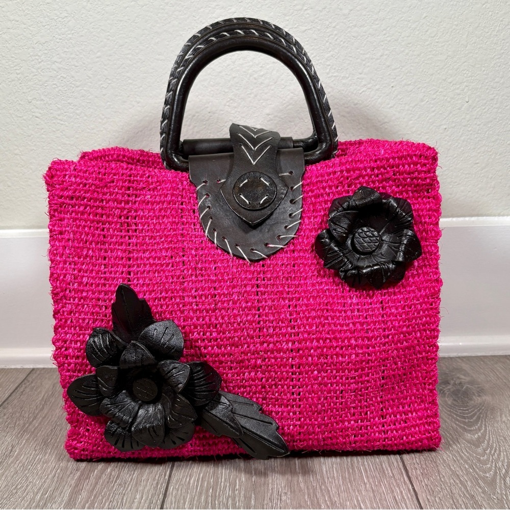 Pink Woven Handbag with Black Floral Accents